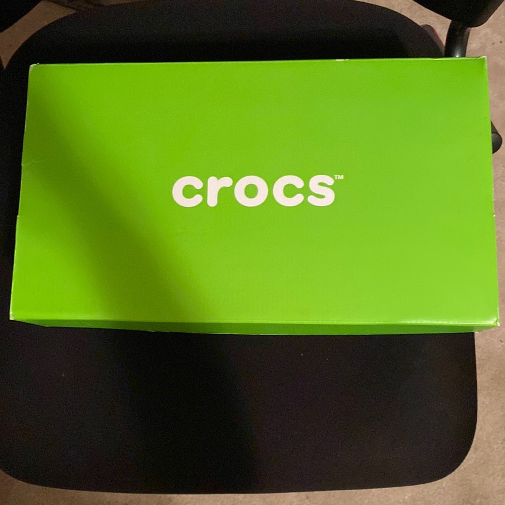 Grey Crocs size 6 in men and 8 in women in brand new condition wore 2 twice